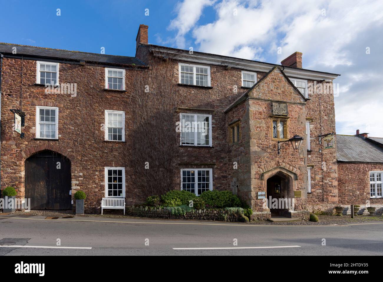 The Luttrell Arms Hotel in the village of Dunster on the edge of the Exmoor National Park near Minehead, Somerset, England. Stock Photo