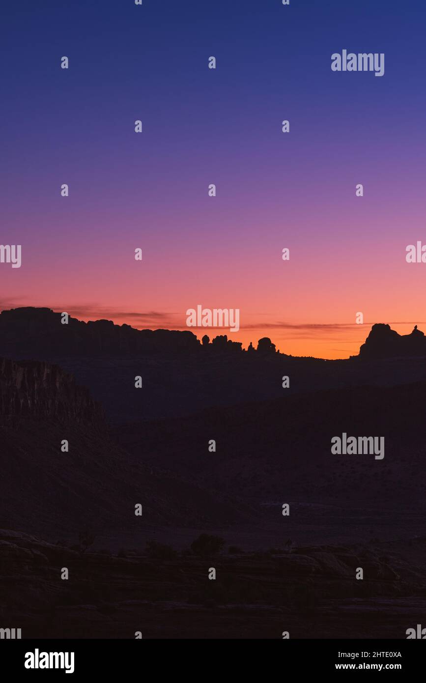 Silhouette of the landscape in the Arches National Park at sunset, Utah, USA Stock Photo
