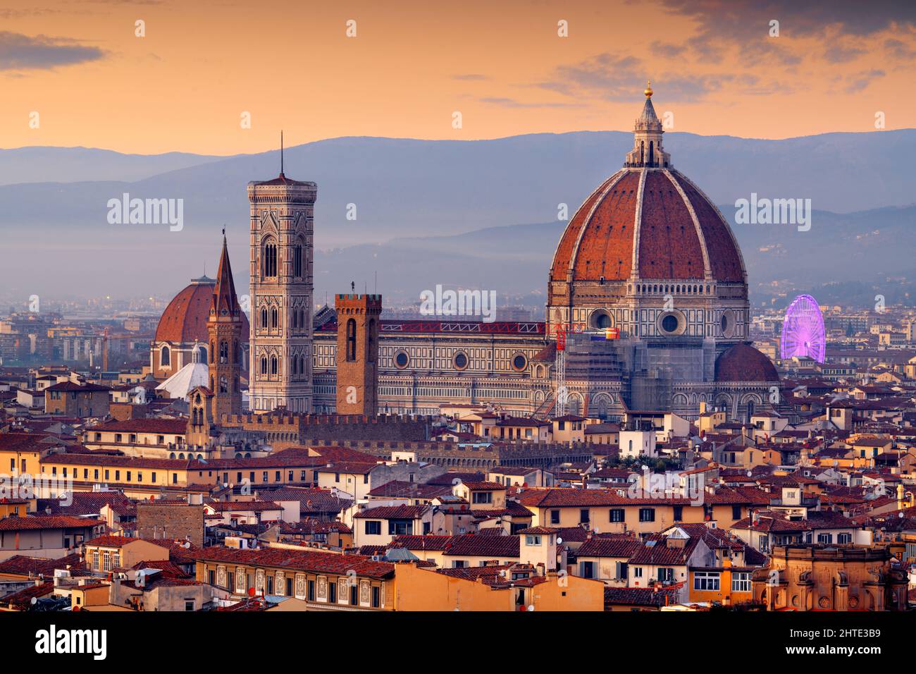 Florence, Italy skyline with landmark buildings at dusk over the Duomo. Stock Photo