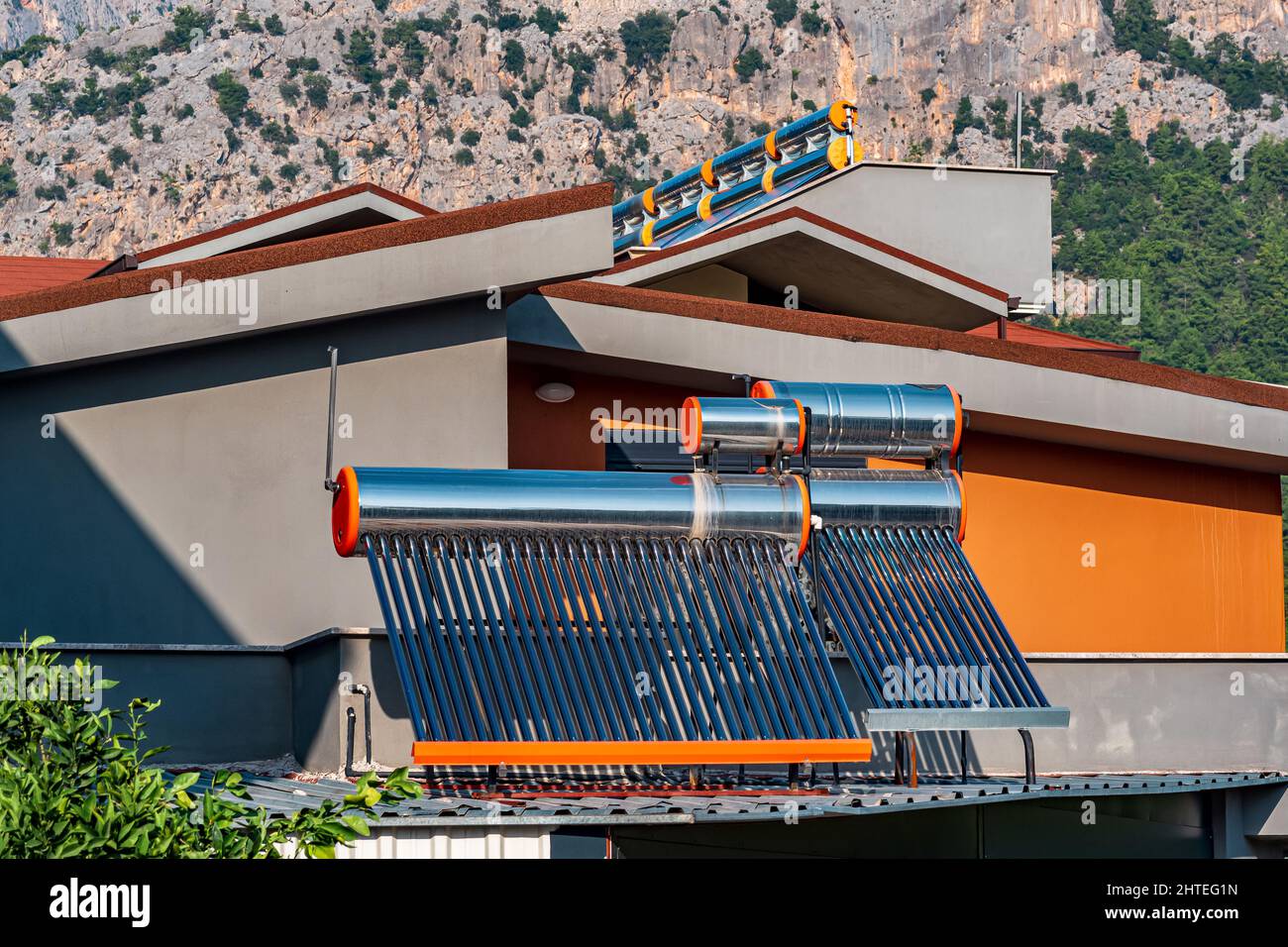solar thermal collectors installed on the roof of a residential ...