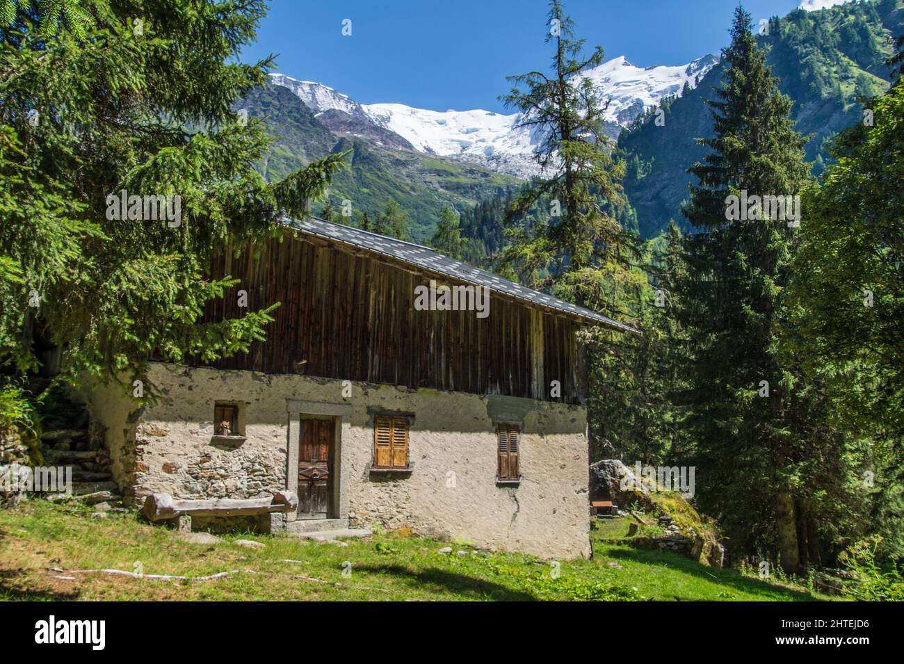 Tranquil landscape of a village house on the mountains of Bionnassay