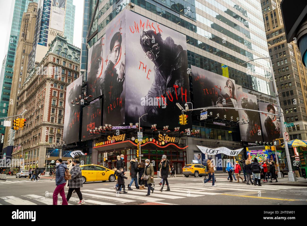 Advertising for the Warner Bros. Pictures’  “The Batman” film is seen in Times Square in New York on Wednesday, February 16, 2022. The film, starring Robert Pattinson, is scheduled to be released in the U.S. on March 4, 2022. (© Richard B. Levine) Stock Photo