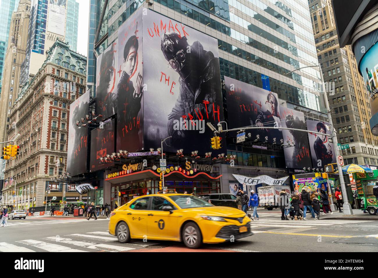 Advertising for the Warner Bros. PicturesÕ  ÒThe BatmanÓ film is seen in Times Square in New York on Wednesday, February 16, 2022. The film, starring Robert Pattinson, is scheduled to be released in the U.S. on March 4, 2022. (© Richard B. Levine) Stock Photo