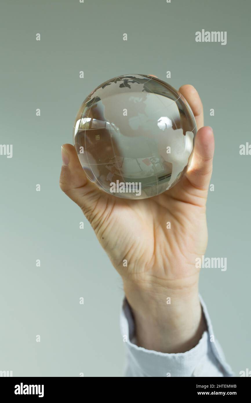 Hand holding globe environment hi-res stock photography and images - Alamy