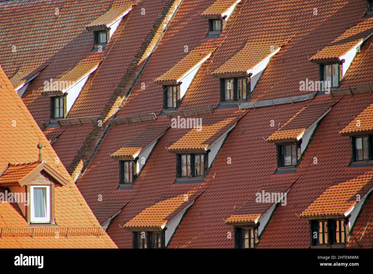 Closeup shot of red roofs and roof windows. Great for background Stock ...