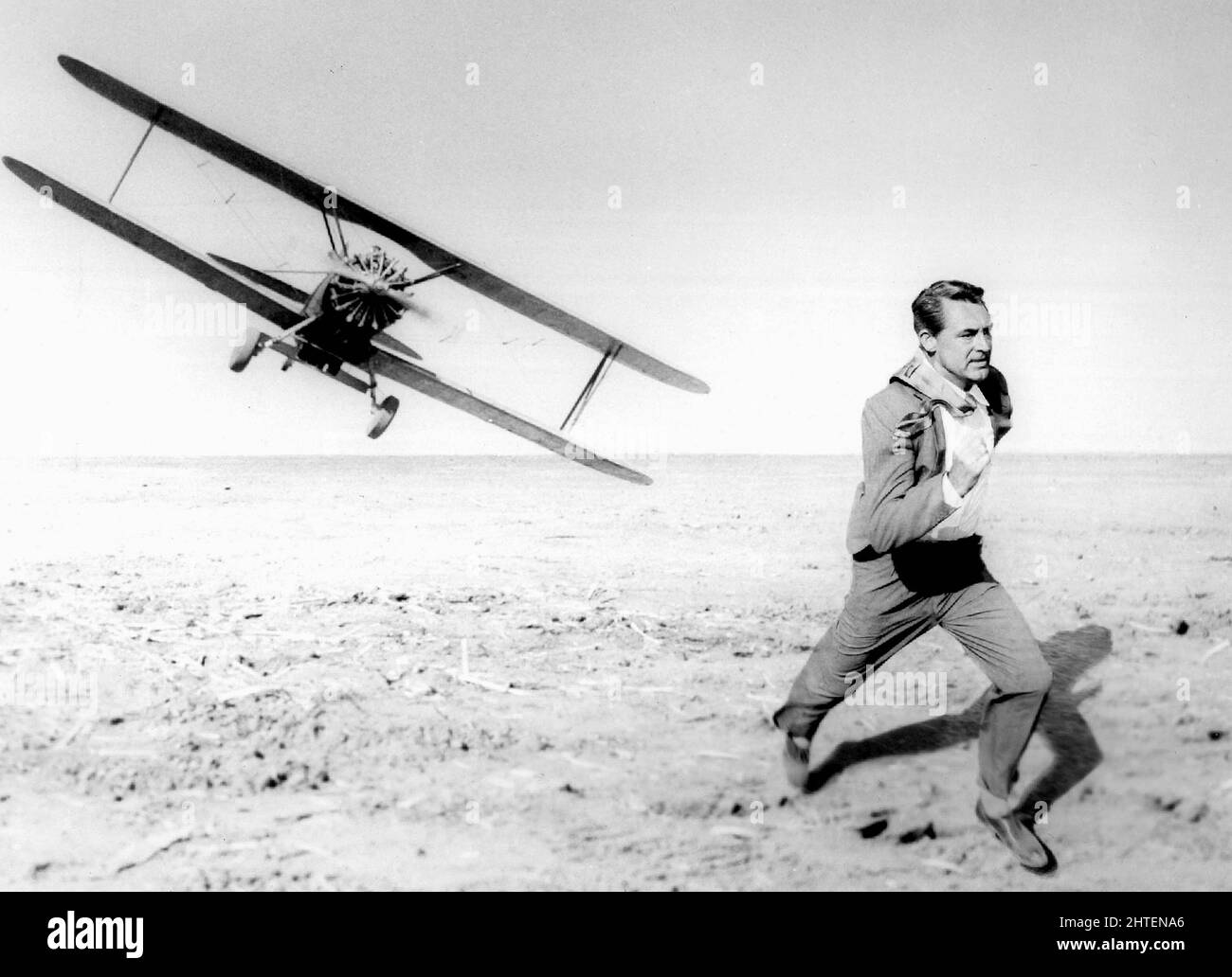 Cary Grant - Iconic scene from North by Northwest - Airplane chase - 1959 Stock Photo