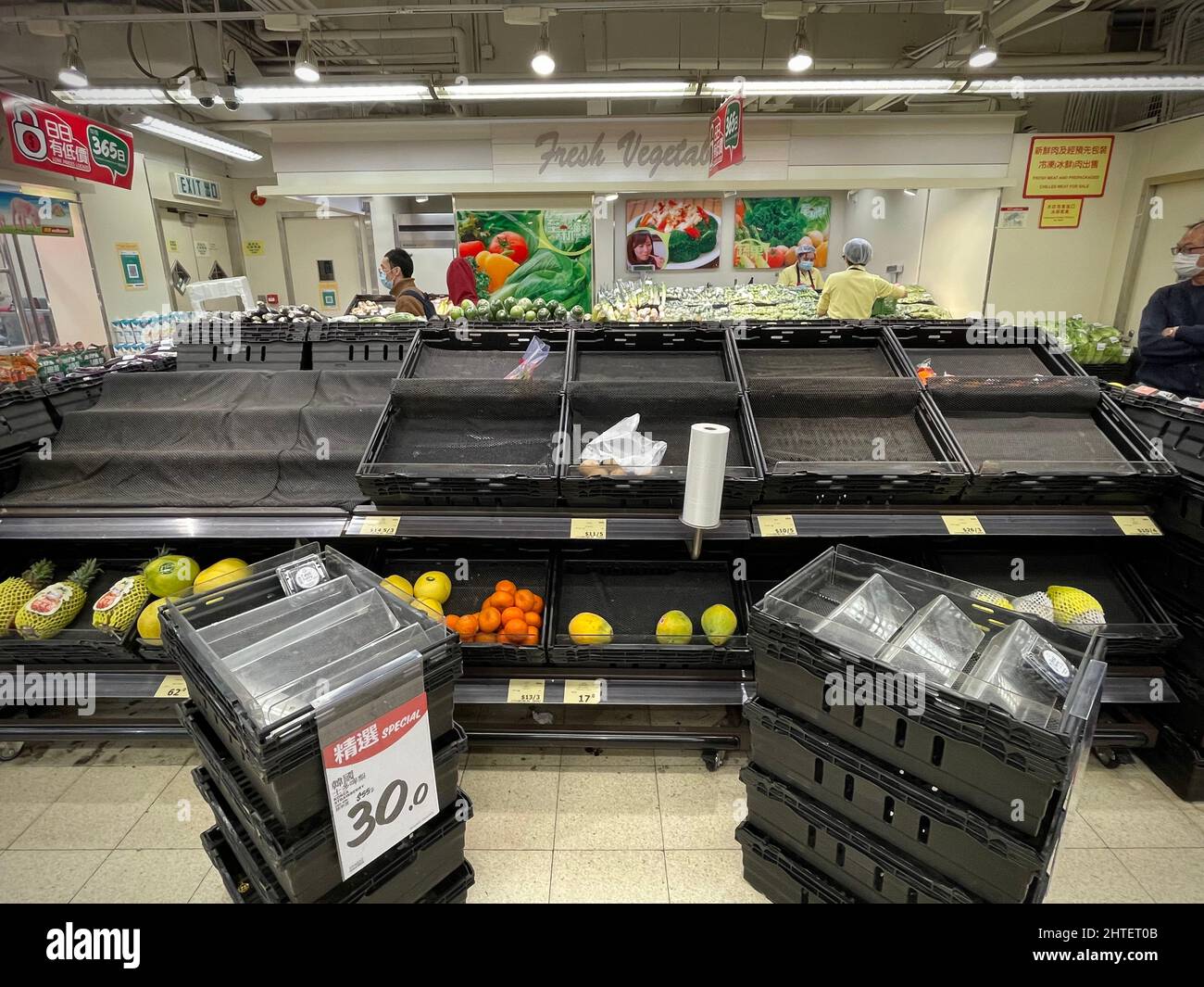 Hong Kong, China. 28th Feb, 2022. Empty shelves inside a supermarket.Hong Kong may impose a Chinese style hard lockdown that confines people to their homes, authorities signaled, with the city's zero-Covid-19 strategy in tatters and bodies piling up in hospitals. People rushed to supermarket to stock up their reserve in preparation. Credit: SOPA Images Limited/Alamy Live News Stock Photo