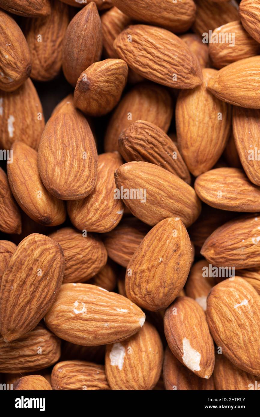 Extreme close-up shot of healthy almonds with copy space Stock Photo