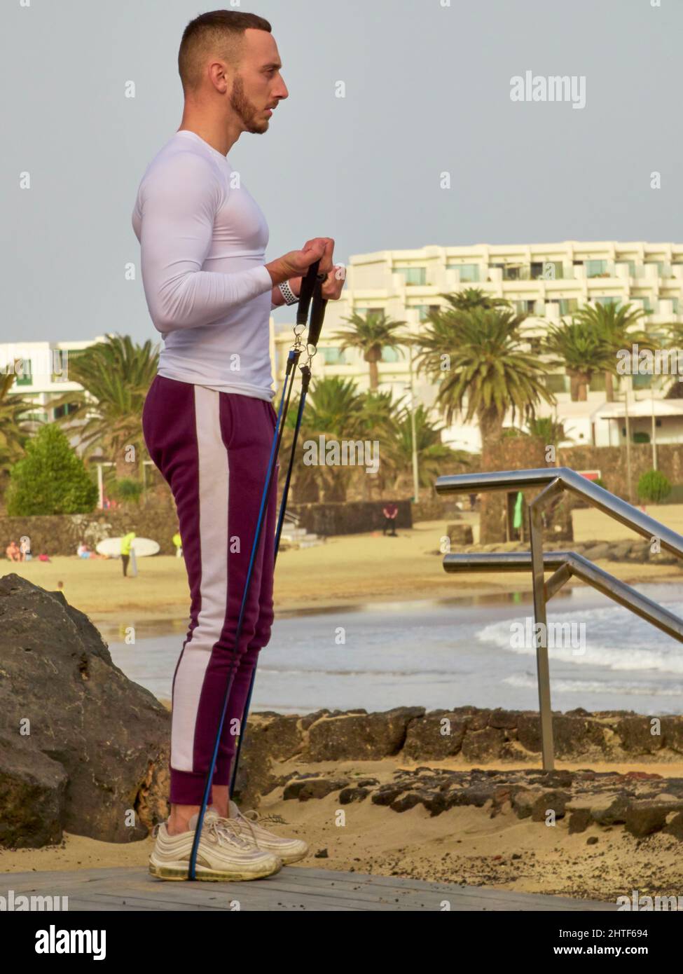 Varied functional training with elastic bands outdoors Stock Photo Alamy