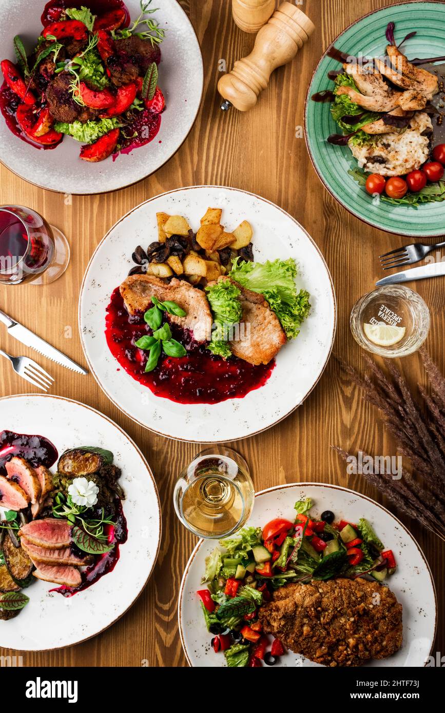 grilled pork with a side dish. restaurant menu Stock Photo Alamy