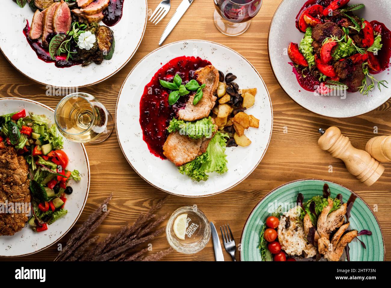 grilled pork with a side dish. restaurant menu Stock Photo Alamy