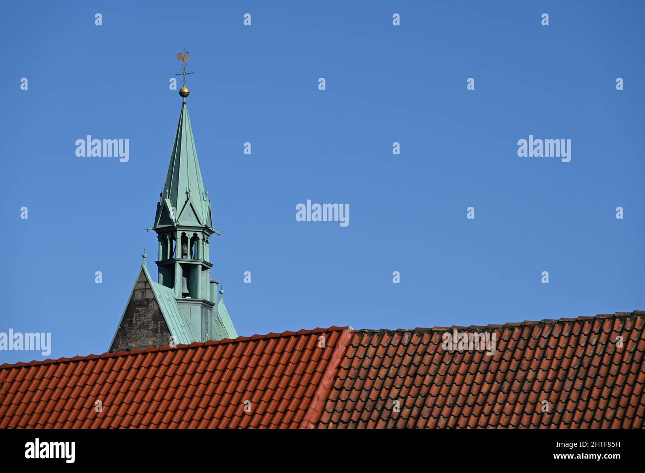 Tower of the St. Martini Church above the roofs of Stadthagen Stock Photo