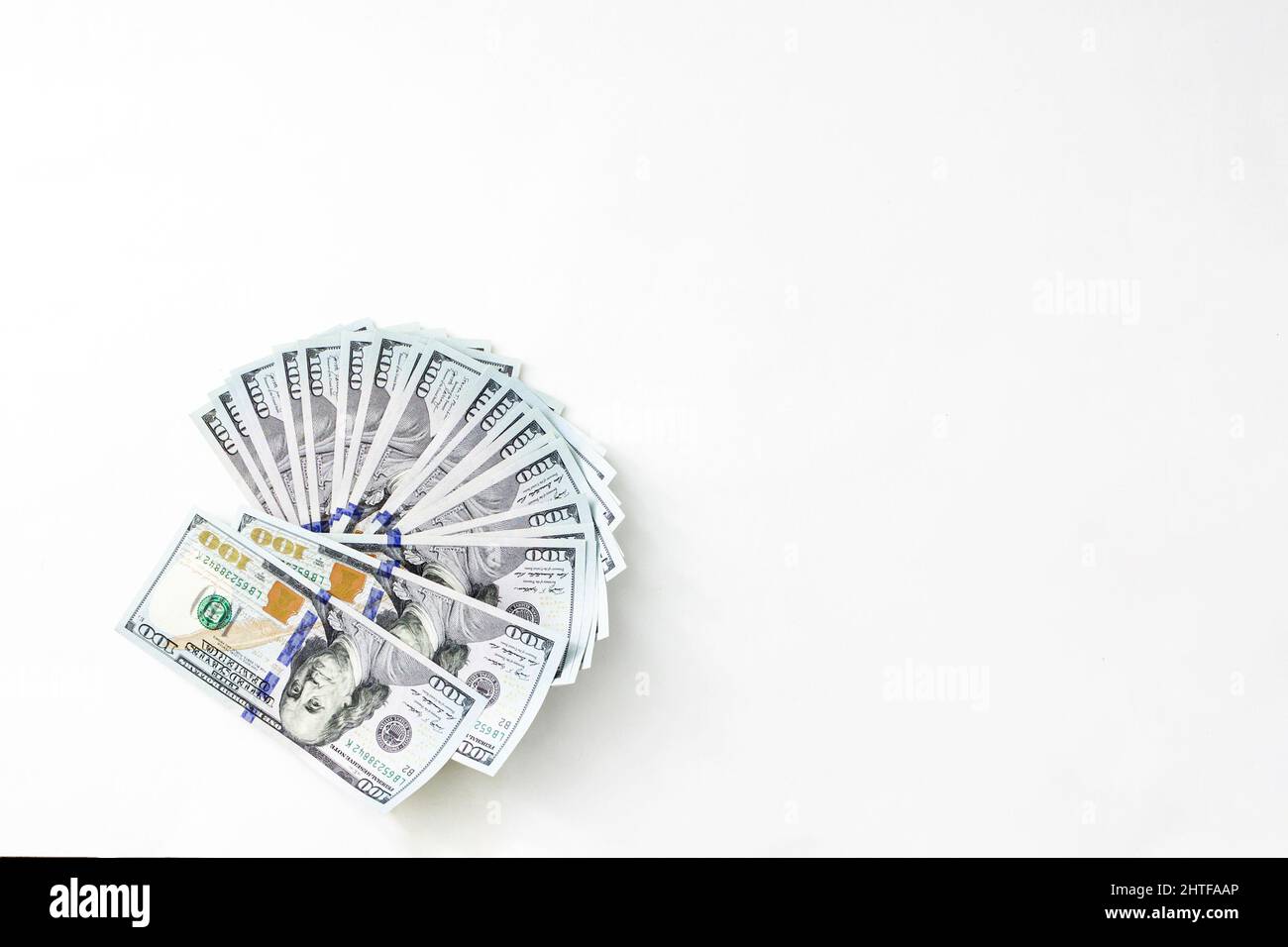 Scrolled stack of dollar bills. American dollar is the official currency of the United States of America Stock Photo