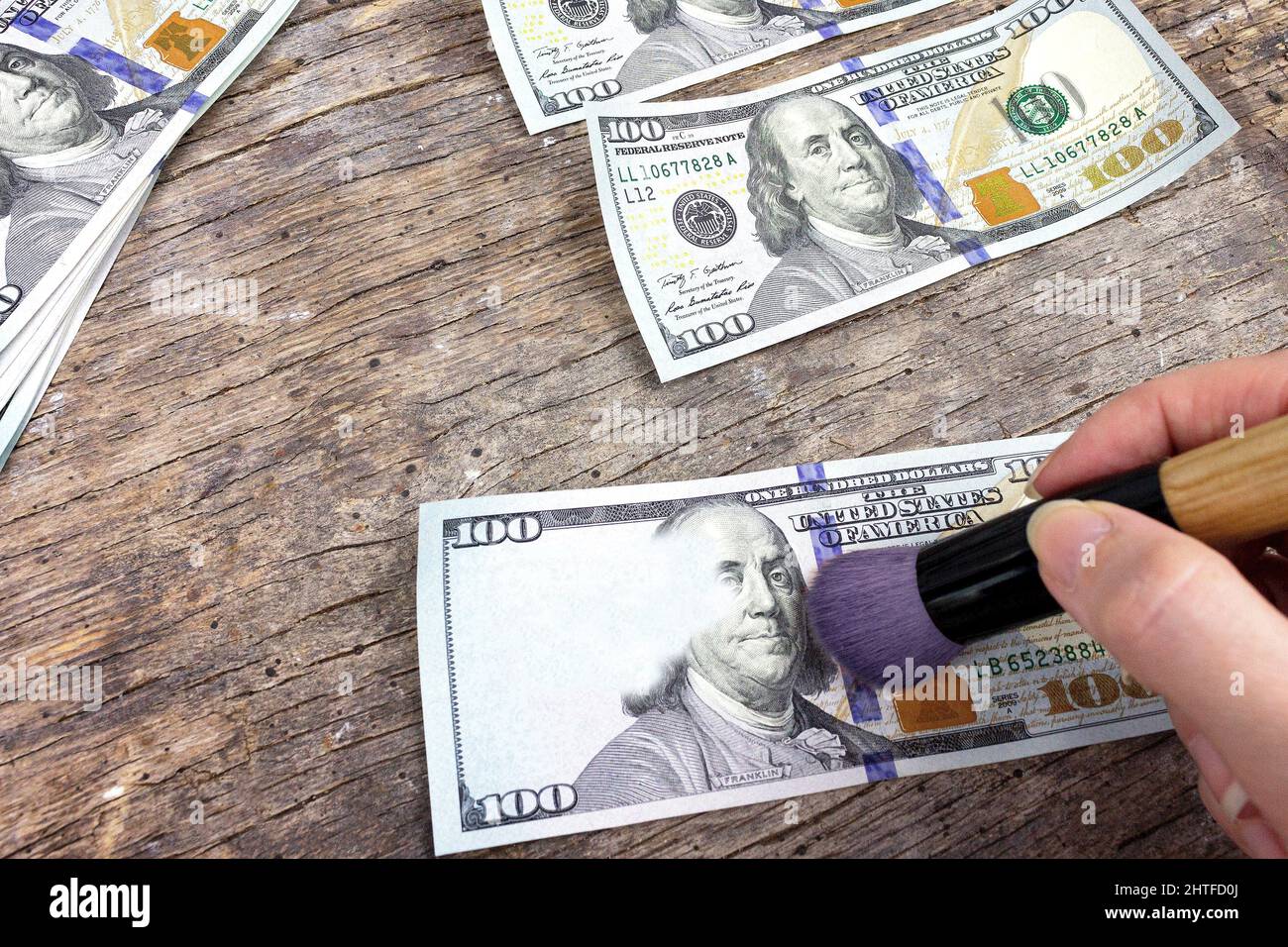 Process make of counterfeit money, Illegal production of US dollars Stock Photo