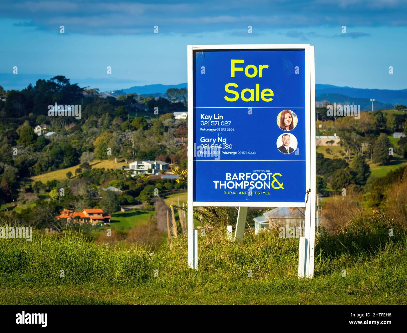 View of Barfoot and Thompson real estate agency For Sale sign in Stock