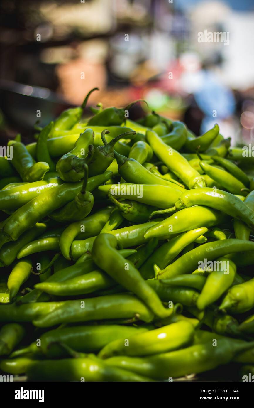 Green chili peppers for sale at a street market Stock Photo Alamy