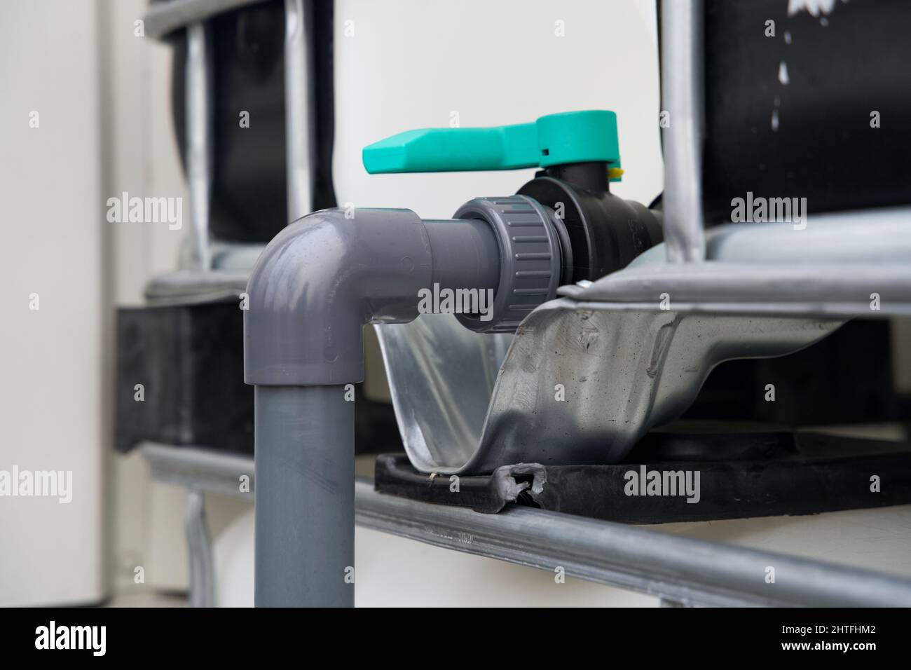 Irrigation system for watering a vertical green wall garden on behalf