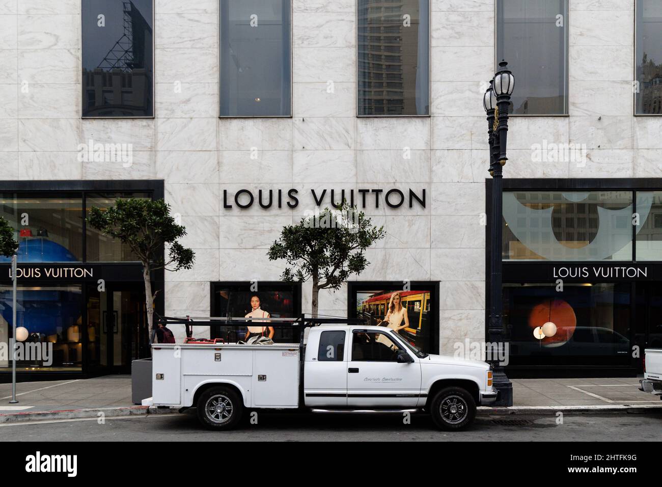 Truck in front of louis vuitton store hi-res stock photography and