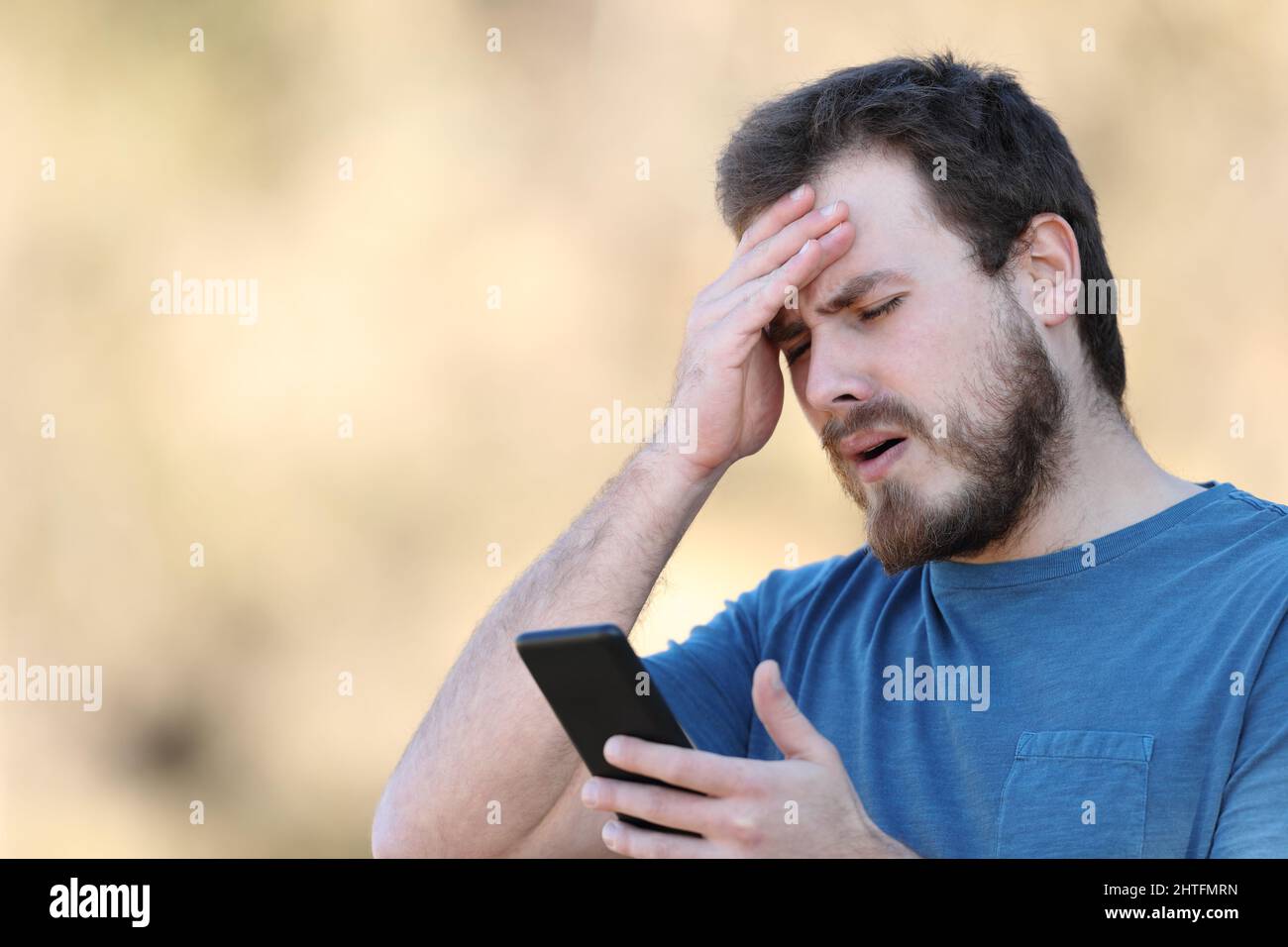 Sad Man Has Bad Online Chat News and Feels Disappointed on the Smartphone.  Stock Photo - Image of disappointment, frustration: 230679098