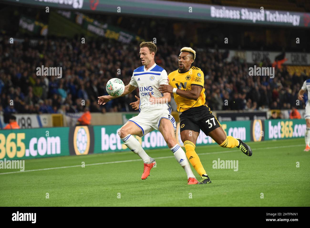 Adama Traore of Wolverhampton Wanderers and Jonny Evans of Leicester City. Wolverhampton Wanderers v Leicester City at Molineux 25/09/2018 - Carabao Cup Stock Photo
