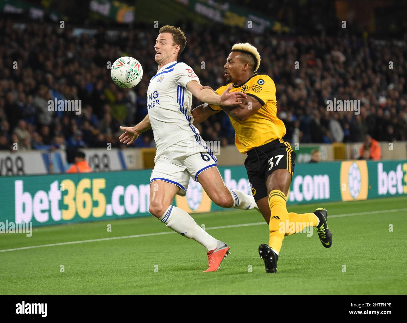 Adama Traore of Wolverhampton Wanderers and Jonny Evans of Leicester City. Wolverhampton Wanderers v Leicester City at Molineux 25/09/2018 - Carabao Cup Stock Photo
