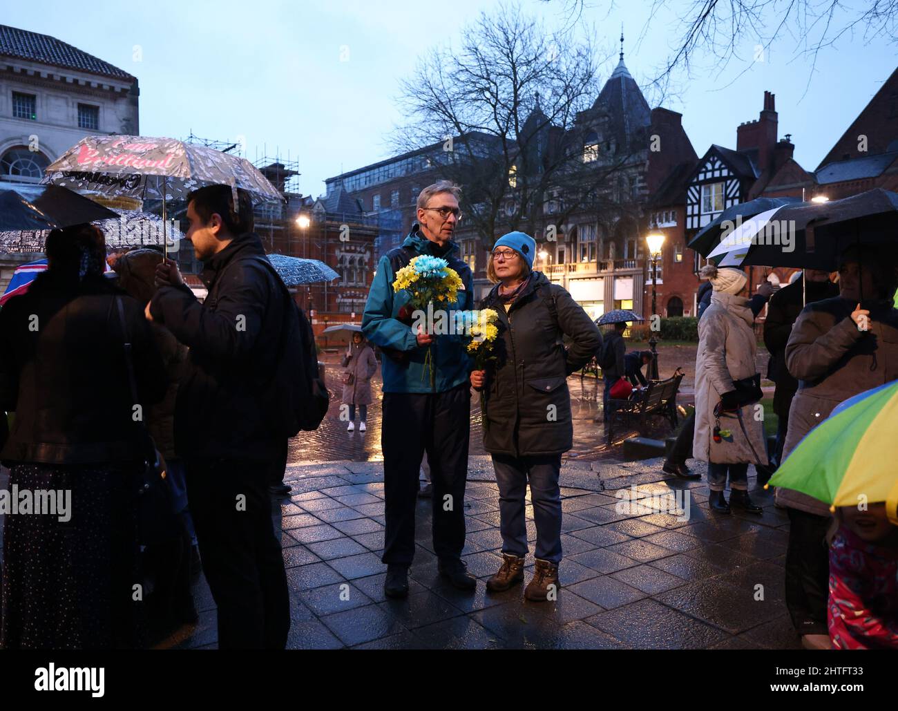 Leicester, Leicestershire, UK. 28th February 2022. Demonstrators attend a vigil after Russian President Vladimir Putin ordered the invasion of Ukraine. Hundreds of people gathered outside the Town Hall to show their support to Ukraine. Credit Darren Staples/Alamy Live News. Stock Photo