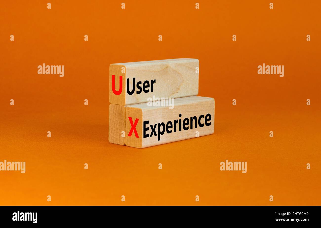 UX user experience symbol. Concept words UX user experience on wooden ...