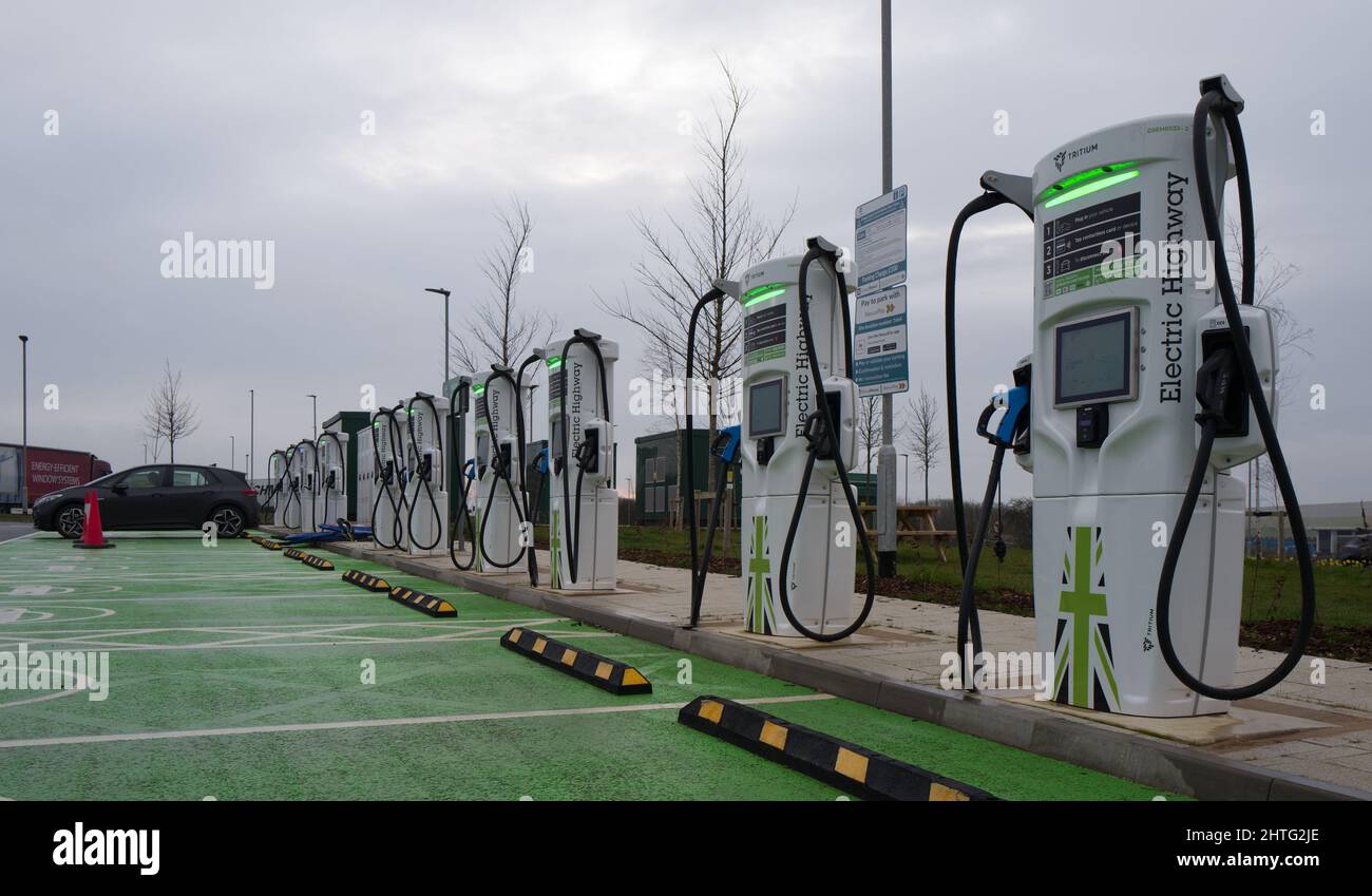 Electric Car (EV BEV Hybrid) Charging Points at Rugby Motorway Service Station on the M6 motorway Stock Photo