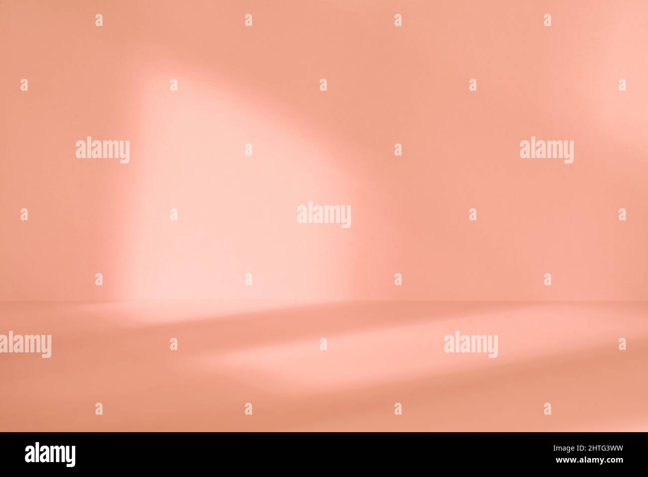 Empty light beige studio space with deep artistic shadow. Minimalistic space concept Stock Photo