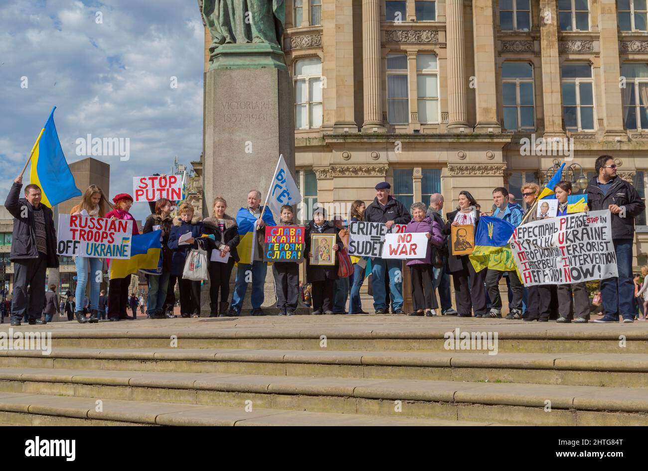 Demonstrators carrying the Ukrainian flag meet in Birmingham city centre to protest the invasion and annexation of Crimea by the Russian Federation. Stock Photo