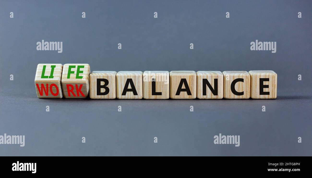 Work life balance symbol. Turned wooden cubes and changed concept words ...