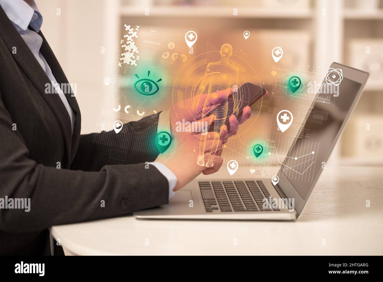 Doctor working on laptop with healthcare concept Stock Photo