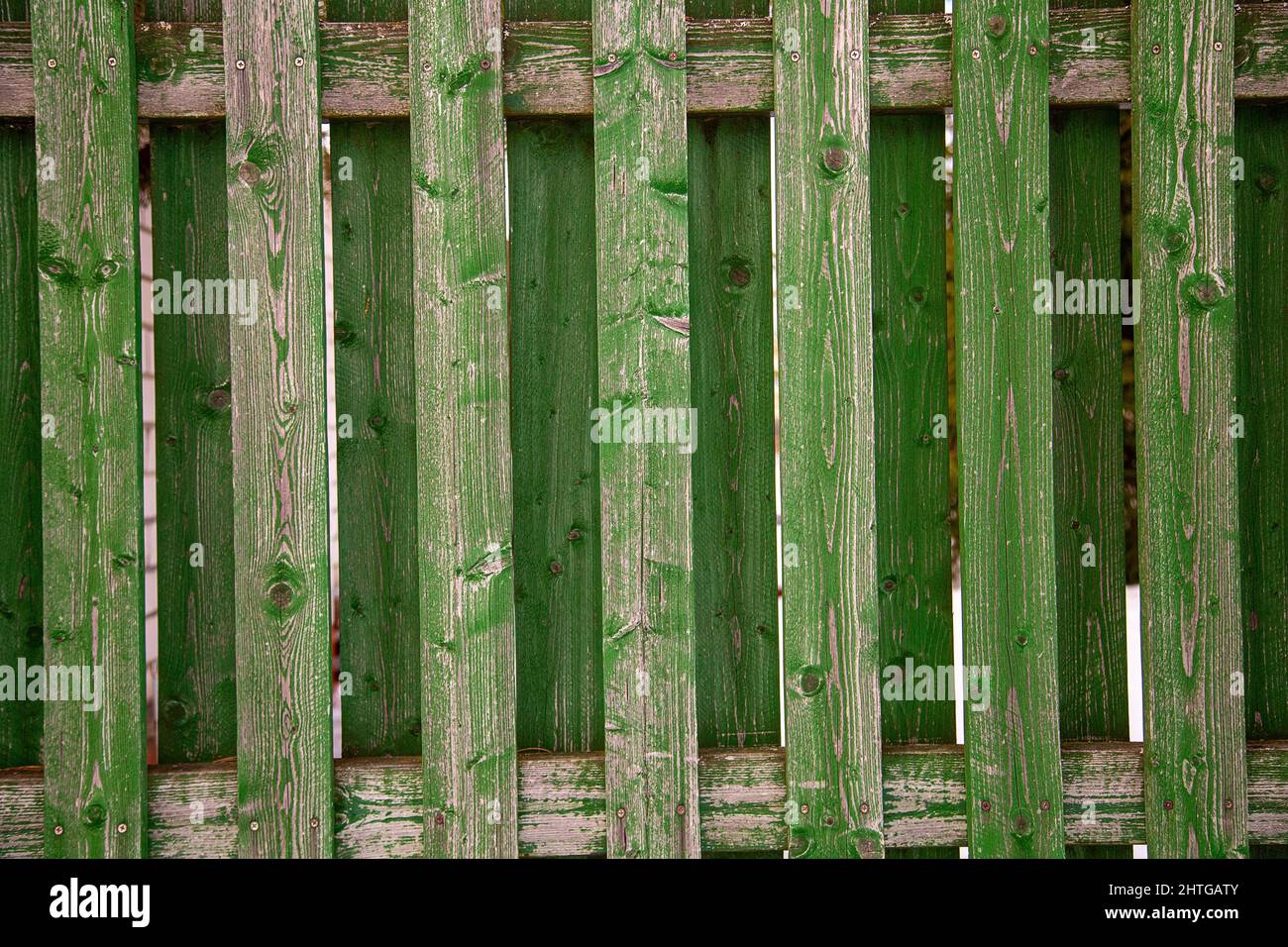 old wooden green fence with peeling paint Stock Photo - Alamy
