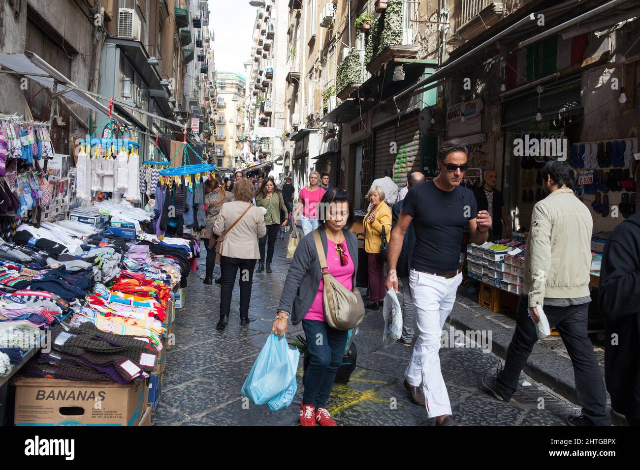 Pedestrians and shoppers on Via Pignasecca in the historic centre of Naples Stock Photo
