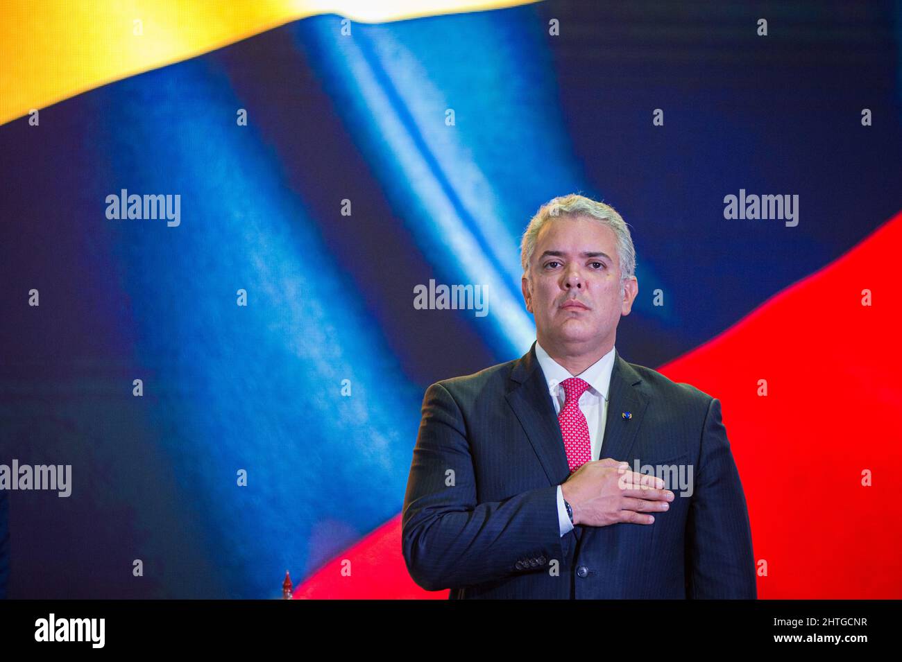 Colombia's president Ivan Duque Marquez sings the national anthem during the inauguration ceremony of the Week of Citizen Security 'Semana de Seguridad Ciudadana' 2022, in Bogota, Colombia where 26 countries take part from February 28 to March 3. On February 28, 2022. Stock Photo