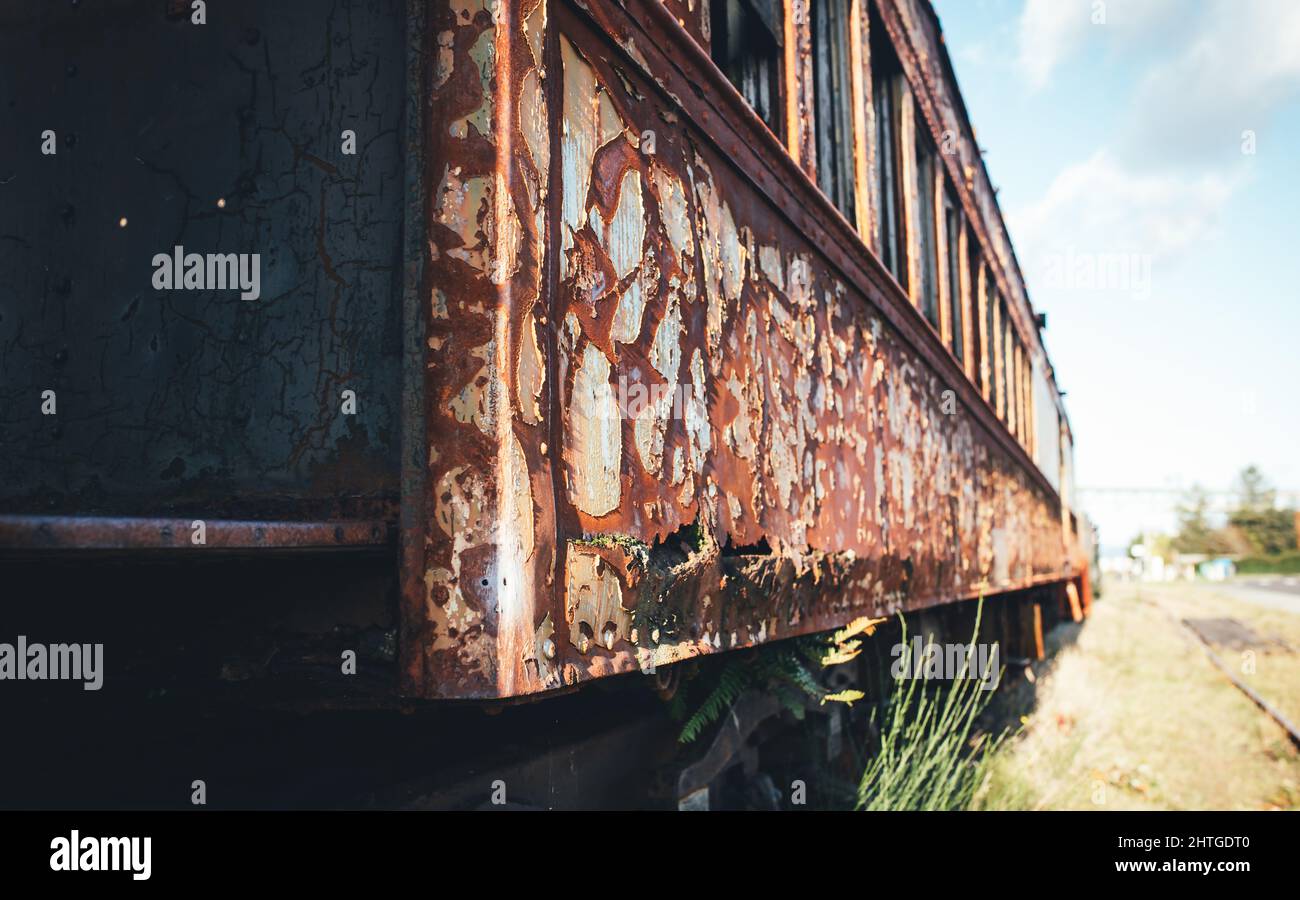 Abandoned rusty passenger train car Stock Photo