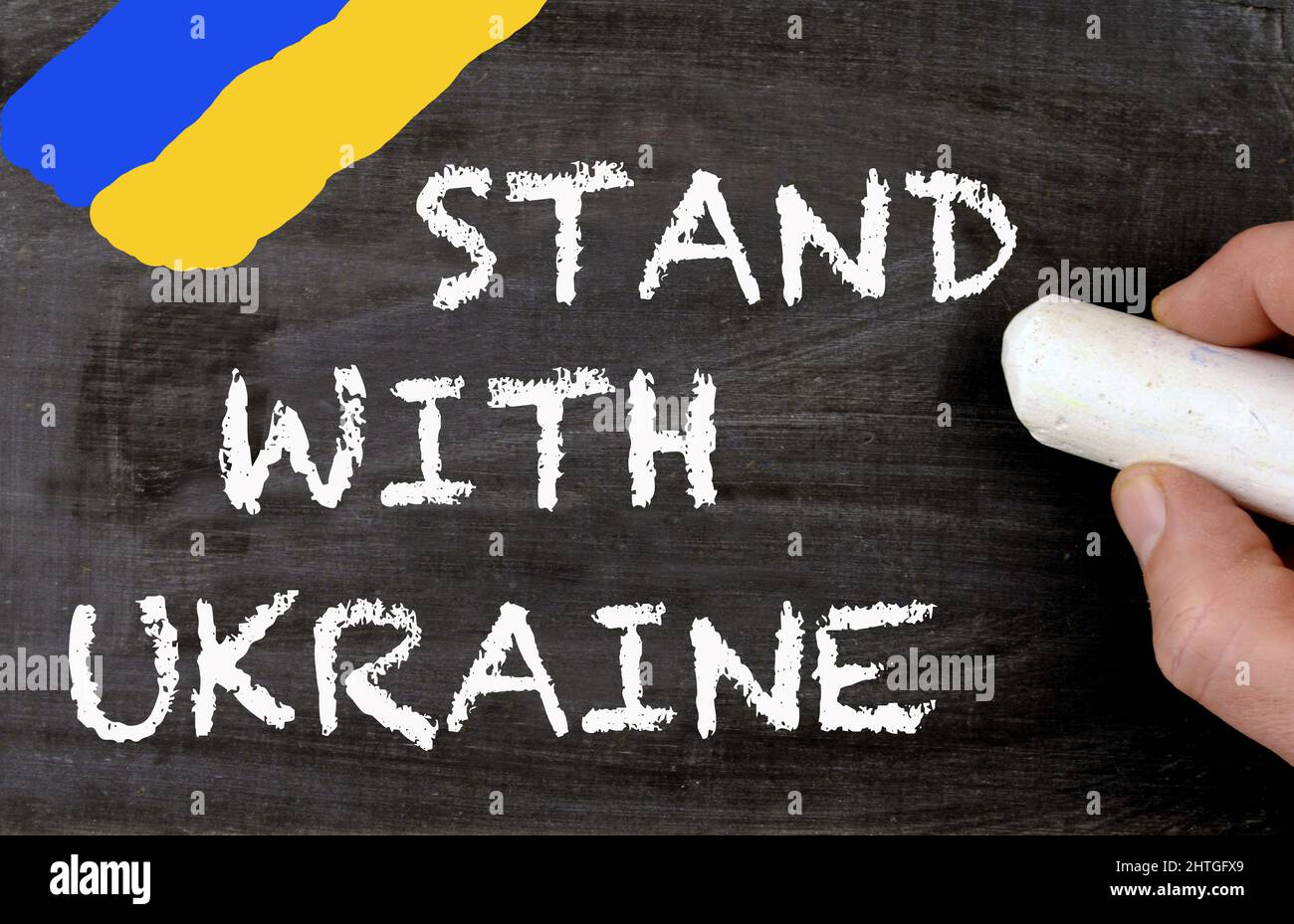 Stand with Ukraine chalkboard and ukrainian colors Stock Photo
