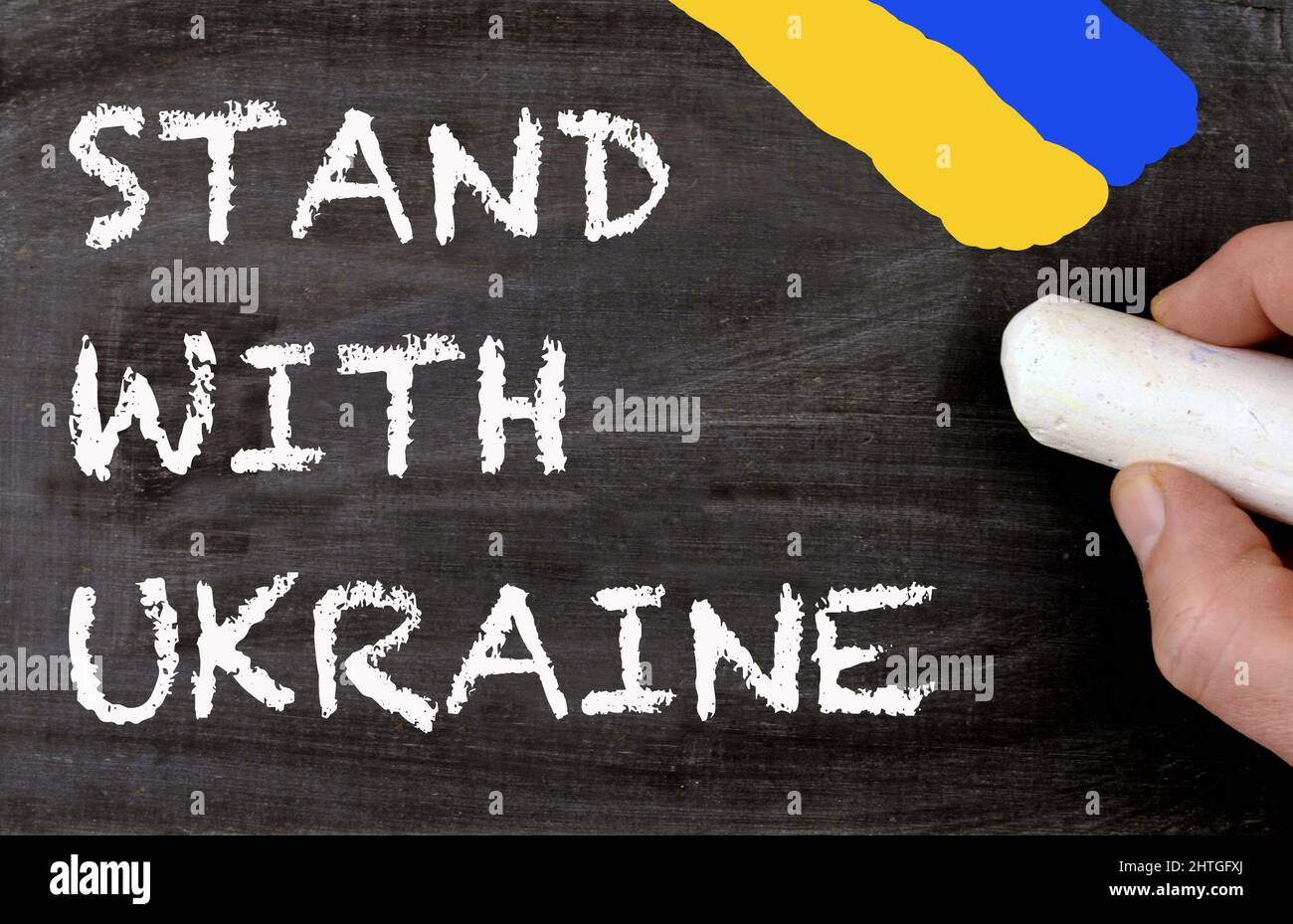 Stand with Ukraine blackboard with flag colors Stock Photo