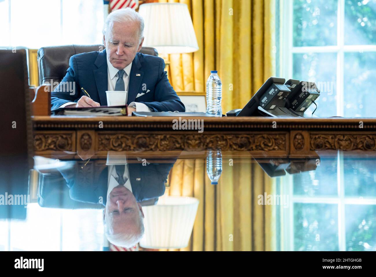 Washington, United States Of America. 28th Feb, 2022. Washington, United States of America. 28 February, 2022. U.S President Joe Biden holds a conference call with NATO allies to discuss the ongoing crisis in Ukraine, from the Oval Office of the White House February 28, 2022 in Washington, DC Credit: Adam Schultz/White House Photo/Alamy Live News Stock Photo