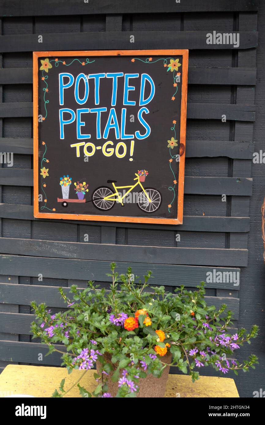 Artistic sign flower arrangement garden store landscaping supplies shop