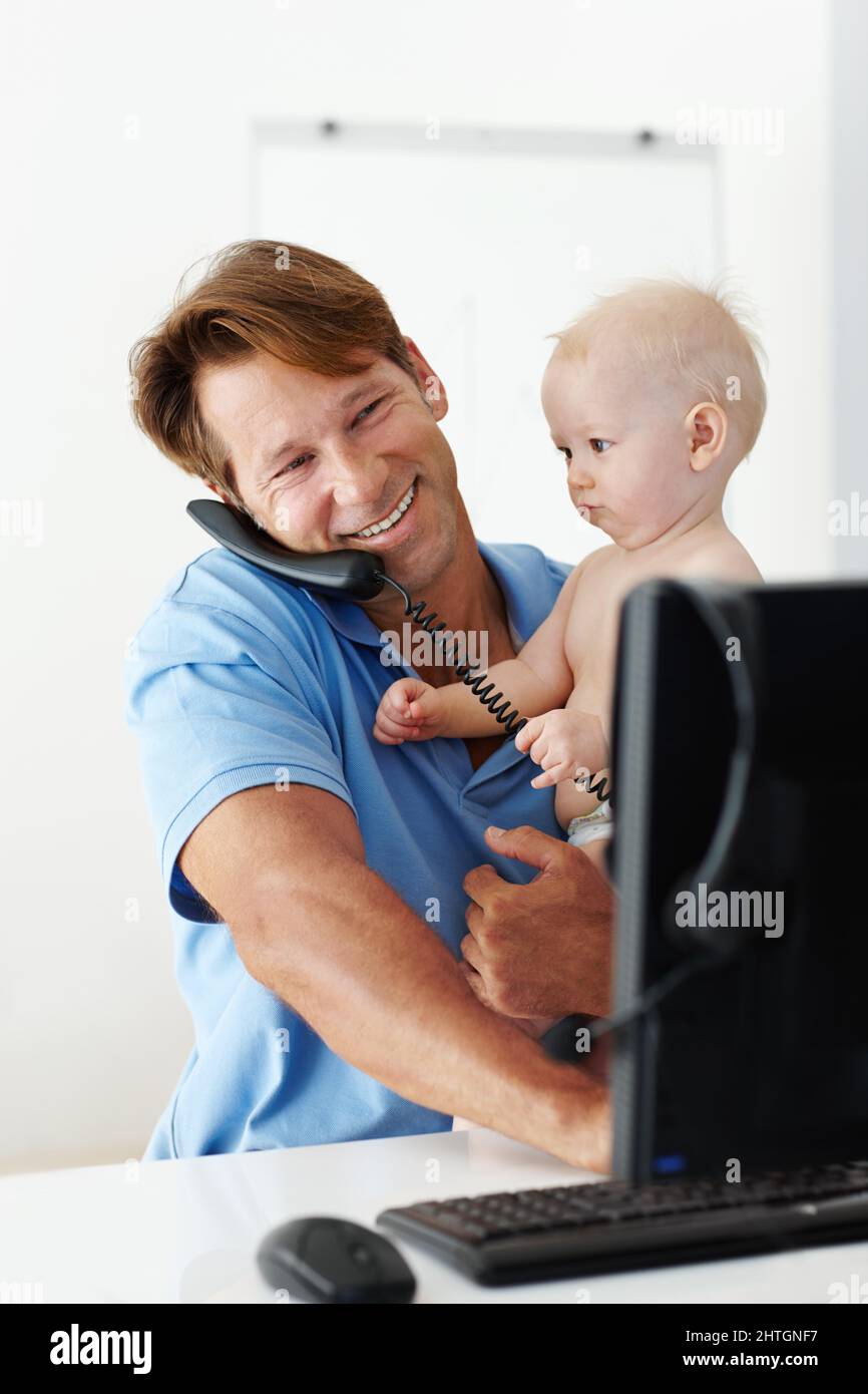 Ive got an important message for you Dad. Shot of a father at his desk ...