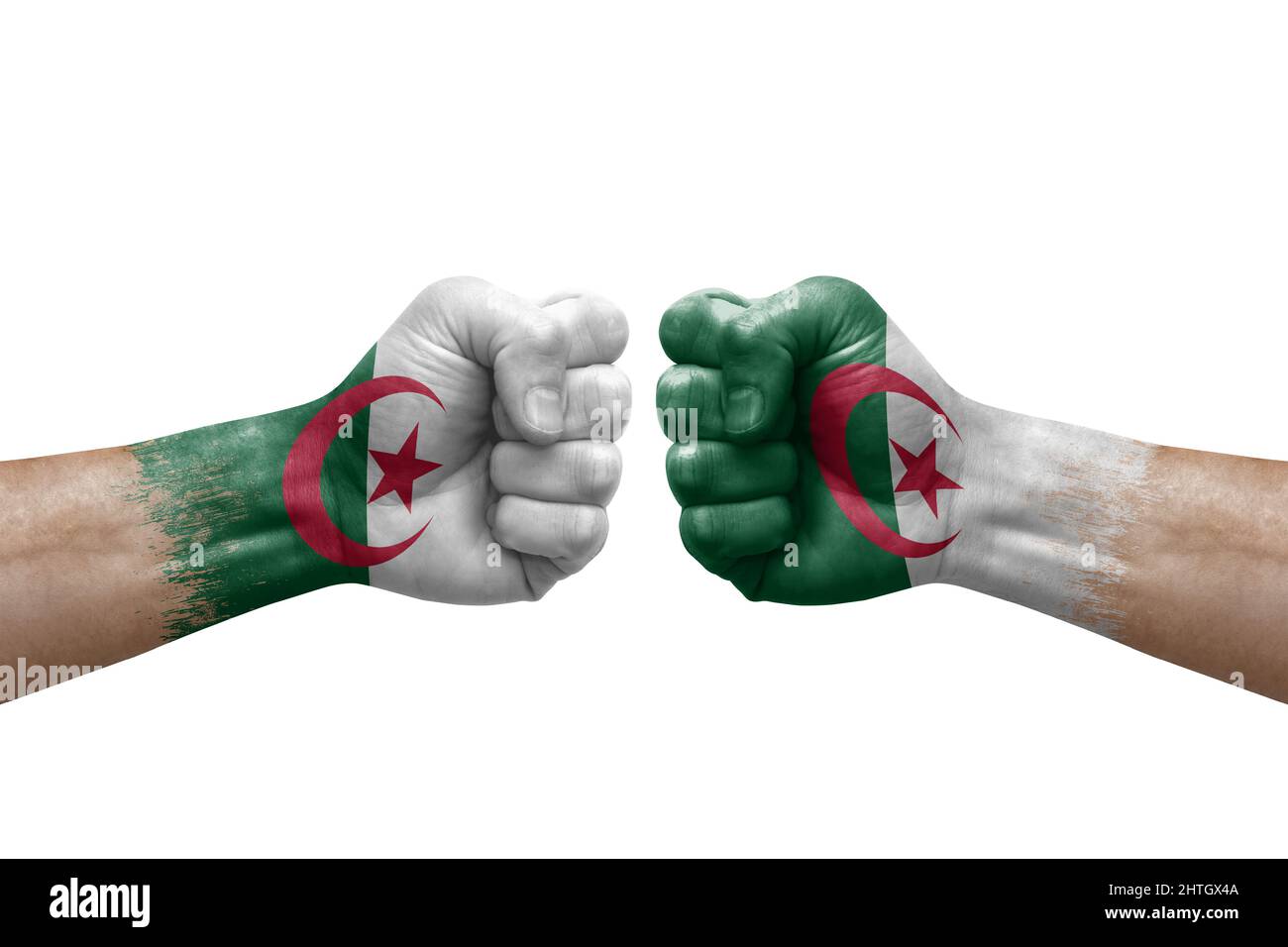 Two hands punch to each others on white background. Country flags painted fists, conflict crisis concept between algeria and algeria Stock Photo