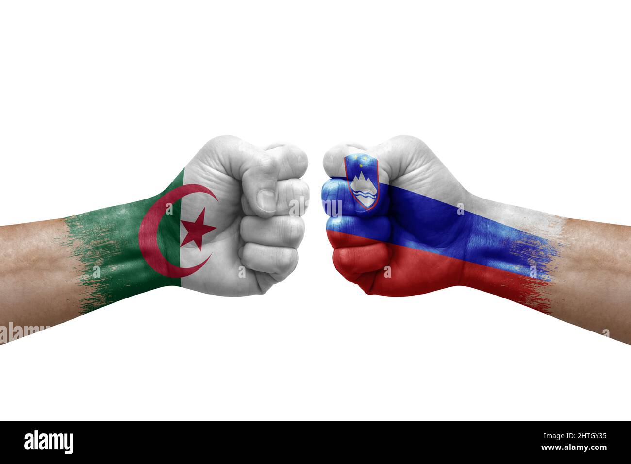Two hands punch to each others on white background. Country flags painted fists, conflict crisis concept between algeria and slovenia Stock Photo
