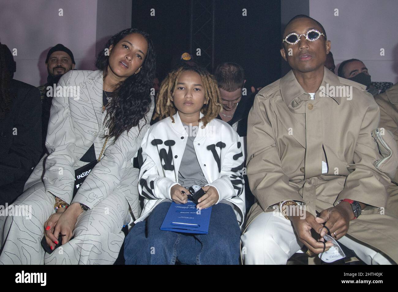 Helen Lasichanh, Rocket Ayer Williams and Pharell Williams attending the Off-White Womenswear Fall/Winter 2022-2023 show Spaceship Earth: An 'Imaginary Experience' at Palais Brongniart during Paris Fashion Week in Paris, France on February 28, 2022. Photo by Aurore Marechal/ABACAPRESS.COM Stock Photo