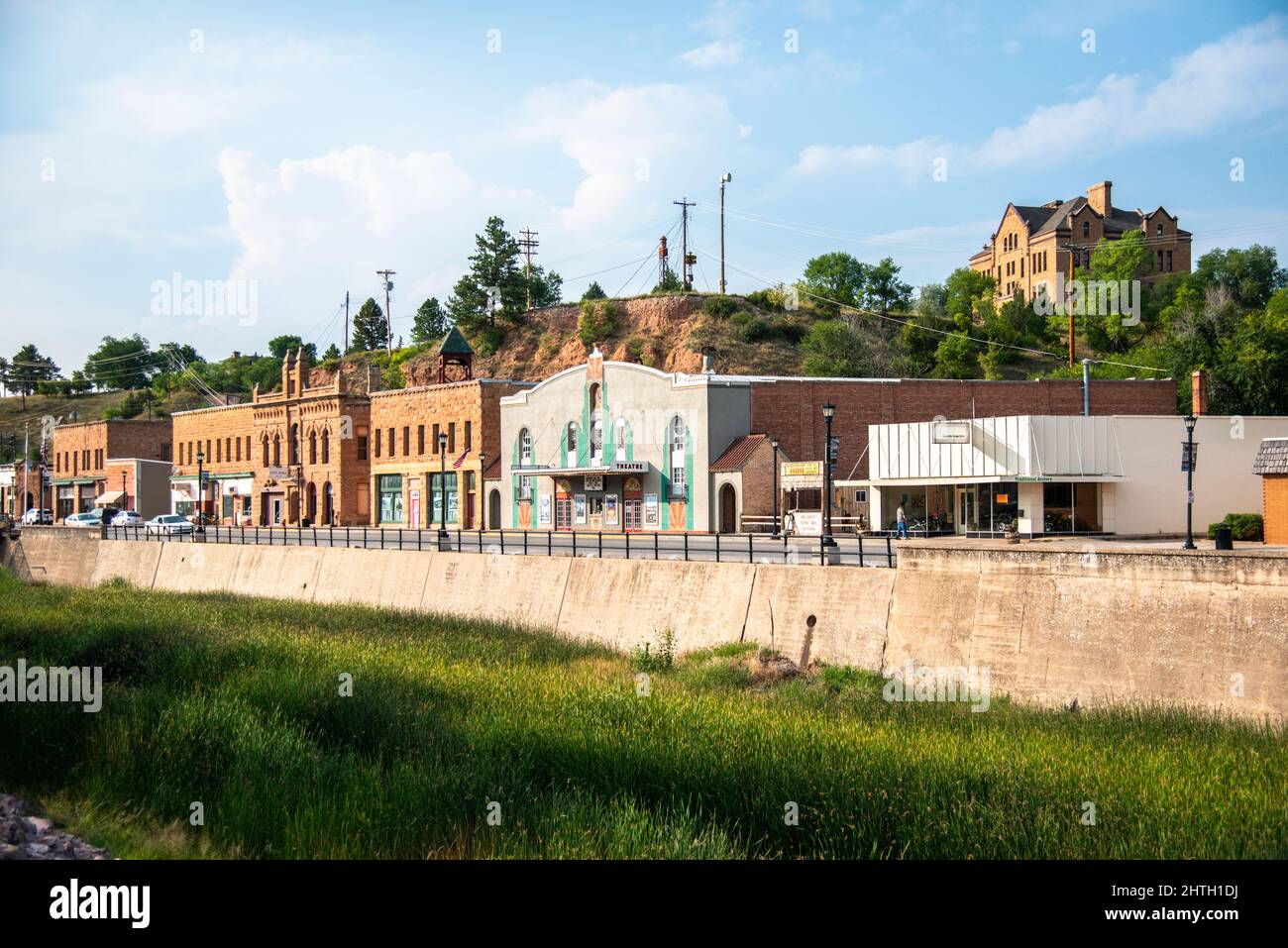 main street and river in Hot Springs, South Dakota showing the theater, and Pioneer Museum on