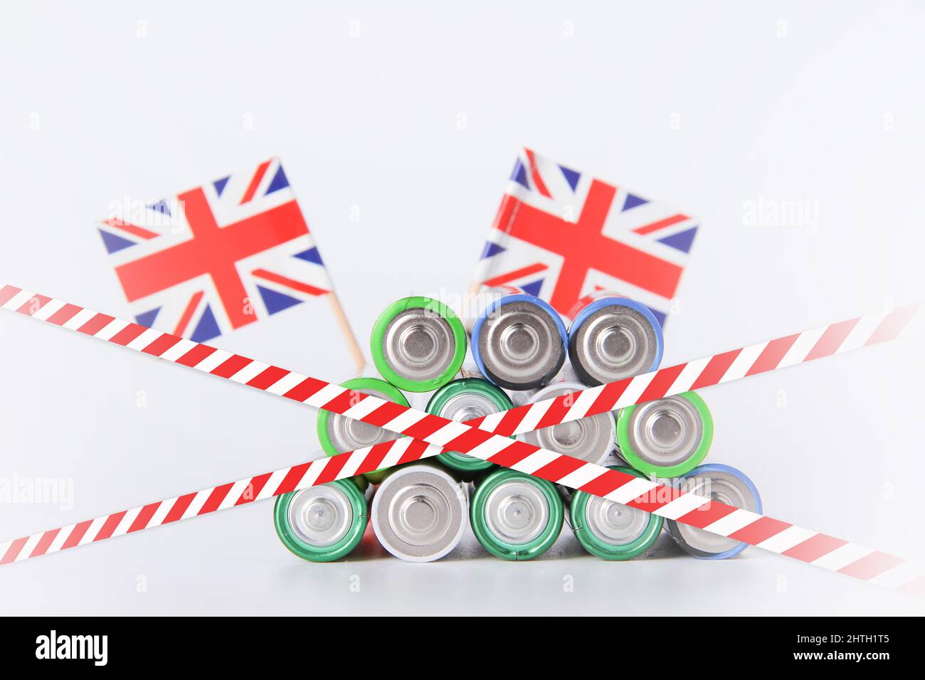 UK battery ban. Batteries are enclosed with red and white tape