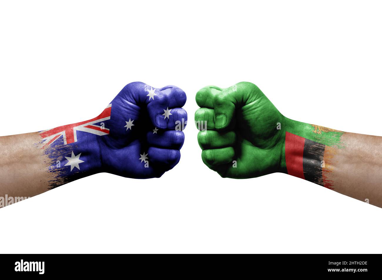 Two hands punch to each others on white background. Country flags painted fists, conflict crisis concept between australia and zambia Stock Photo