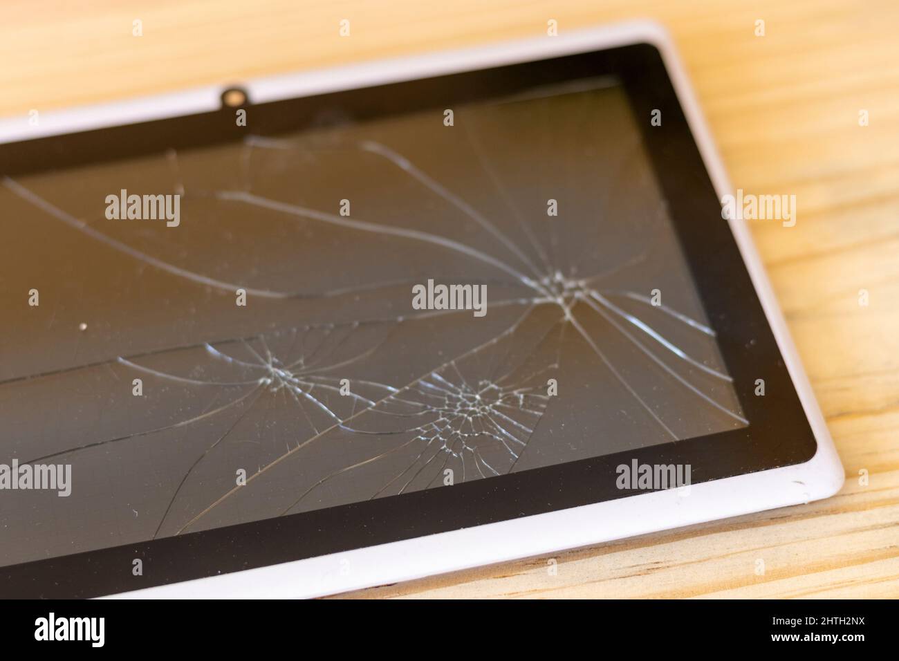 Broken screen of a tablet device Stock Photo