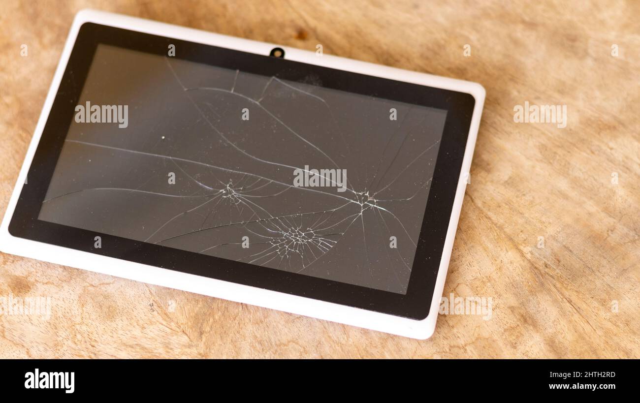 Tablet device with broken screen Stock Photo