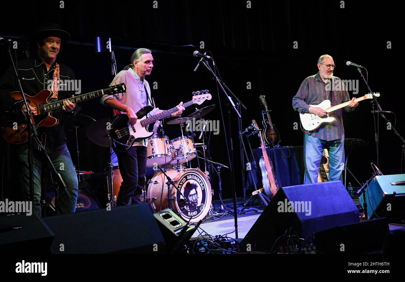 Melbourne, United States. 27th Feb, 2022. (L-R) Mark Cosgrove, Suavek Zaniesienko, and David Bromberg perform on stage at the Studio Theatre at the King Center for the Performing Arts in Melbourne. Credit: SOPA Images Limited/Alamy Live News Stock Photo
